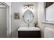 Bathroom vanity featuring modern vanity, decorative mirror, and light fixture at 996 Blue Ridge Ne Ave, Atlanta, GA 30306
