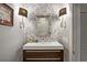 Bathroom featuring decorative wall paper, modern sink, lighting fixtures, and accents at 996 Blue Ridge Ne Ave, Atlanta, GA 30306