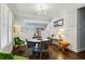 Elegant dining room with modern lighting, wainscoting, and hardwood floors at 996 Blue Ridge Ne Ave, Atlanta, GA 30306