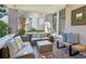 A stylish front porch with comfortable seating and a mosaic-tiled floor at 996 Blue Ridge Ne Ave, Atlanta, GA 30306
