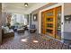 Inviting front porch featuring tiled flooring and comfortable seating area with a wooden front door at 996 Blue Ridge Ne Ave, Atlanta, GA 30306