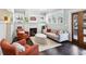 Cozy living room featuring a fireplace, built-in shelving, and plentiful natural light at 996 Blue Ridge Ne Ave, Atlanta, GA 30306