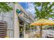 Exterior view of a Seafood Market featuring a yellow umbrella and outdoor seating at 996 Blue Ridge Ne Ave, Atlanta, GA 30306