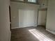 Bedroom featuring hardwood floors, and neutral decor at 1920 Moores Mill Nw Rd, Atlanta, GA 30318
