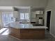Modern kitchen with stainless steel appliances, subway tile backsplash, and eat-in breakfast bar at 1920 Moores Mill Nw Rd, Atlanta, GA 30318