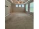 Spacious main bedroom with a tray ceiling and large windows at 2021 Towneship Trl, Roswell, GA 30075