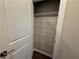A well-organized closet features wire shelving offering ample storage space at 2021 Towneship Trl, Roswell, GA 30075