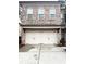 Exterior shot of a two-car garage on a brick townhome at 2021 Towneship Trl, Roswell, GA 30075