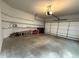 Spacious garage with ample storage shelving and plenty of room for parking at 2021 Towneship Trl, Roswell, GA 30075