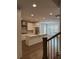 Modern kitchen features an island, stainless steel appliances, and elegant pendant lighting at 2021 Towneship Trl, Roswell, GA 30075