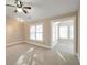 Bedroom with neutral carpet, natural light, ceiling fan and ensuite bathroom at 572 Vinings Estates Se Dr # B9, Mableton, GA 30126