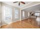 Living room with hardwood floors, recessed lighting and large windows at 572 Vinings Estates Se Dr # B9, Mableton, GA 30126