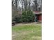 Charming one-story brick home with a landscaped front yard and mature plantings at 2765 Rollingwood Se Ln, Atlanta, GA 30316