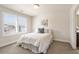 Bright bedroom with large windows, plush carpeting, and neutral walls; perfect for relaxation and comfort at 2820 Garonne Way, Cumming, GA 30041