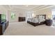 Spacious main bedroom with tray ceilings, plush carpeting, and many windows at 2820 Garonne Way, Cumming, GA 30041