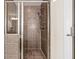 Tiled stand up shower with glass door at 2820 Garonne Way, Cumming, GA 30041