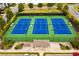 Aerial view of well-maintained community tennis courts showcases the community's recreational facilities at 2820 Garonne Way, Cumming, GA 30041