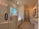 Bathroom showcasing a glass-enclosed shower, soaking tub, and modern fixtures at 34 Harmony Ridge Dr, Temple, GA 30179