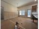 An elegant dining room features a chandelier and wainscoting at 34 Harmony Ridge Dr, Temple, GA 30179