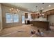 Open kitchen and living space with large island, ample counter space, and recessed lighting at 34 Harmony Ridge Dr, Temple, GA 30179