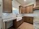 Close-up view of kitchen featuring stone countertops, white subway tile, and modern faucet at 34 Harmony Ridge Dr, Temple, GA 30179