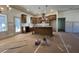 Open kitchen and living space with large island, ample counter space, and recessed lighting at 34 Harmony Ridge Dr, Temple, GA 30179