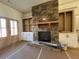 A stone fireplace and built-in shelves give this living room character and charm at 34 Harmony Ridge Dr, Temple, GA 30179