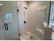 Modern tiled shower with glass doors and a rain shower head at 34 Harmony Ridge Dr, Temple, GA 30179