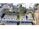 Gorgeous aerial view highlighting townhomes nestled among mature trees and landscaping, near local services at 376 Provenance Dr, Atlanta, GA 30328