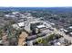 Scenic aerial view of neighborhood with townhomes, shopping areas, and green spaces at 376 Provenance Dr, Atlanta, GA 30328