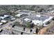 Aerial view showcasing townhomes, landscaping, and a serene pond within a vibrant community at 376 Provenance Dr, Atlanta, GA 30328