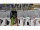 Aerial view of townhomes showcasing roof styles and garages at 376 Provenance Dr, Atlanta, GA 30328