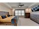 Large main bedroom with a rustic bed frame and vaulted ceilings at 376 Provenance Dr, Atlanta, GA 30328