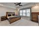 Large main bedroom with a rustic bed frame and vaulted ceilings at 376 Provenance Dr, Atlanta, GA 30328