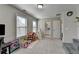Spacious bedroom with two large windows and ensuite bathroom at 376 Provenance Dr, Atlanta, GA 30328