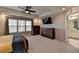 Large main bedroom with a view to the backyard at 376 Provenance Dr, Atlanta, GA 30328