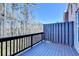 Outdoor deck area with view of trees and sky at 376 Provenance Dr, Atlanta, GA 30328