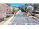 View of the gated entrance with townhomes on either side of the gate at 376 Provenance Dr, Atlanta, GA 30328