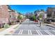 View of the gated entrance with townhomes on either side of the gate at 376 Provenance Dr, Atlanta, GA 30328