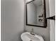 Powder room with stylish mirror, modern faucet, and elegant design at 376 Provenance Dr, Atlanta, GA 30328