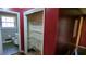 Walk in closet with shelving beside the bathroom at 868 Maxey Hill Ct, Stone Mountain, GA 30083