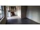 Kitchen featuring an eating area and a contrasting dark floor, with a large window for natural light at 868 Maxey Hill Ct, Stone Mountain, GA 30083