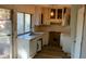 Well-lit kitchen featuring sink, window and light fixture at 868 Maxey Hill Ct, Stone Mountain, GA 30083