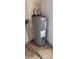 Close-up of a Rheem hot water heater in a utility area at 868 Maxey Hill Ct, Stone Mountain, GA 30083