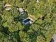 Aerial view of the home showcasing backyard pool, outdoor patio and surrounding nature at 9435 Grande Dr, Winston, GA 30187