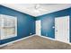 Bedroom featuring two closets, one window, and carpet flooring at 9435 Grande Dr, Winston, GA 30187