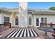 Outdoor deck featuring ample space for seating, perfect for relaxation and outdoor dining with an outdoor rug at 9435 Grande Dr, Winston, GA 30187