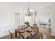 Formal dining room with hardwood floors and a chandelier at 9435 Grande Dr, Winston, GA 30187