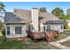 Back of the house featuring a deck and outdoor patio at 9435 Grande Dr, Winston, GA 30187