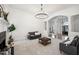 Spacious living room featuring a fireplace, neutral tones, and modern furnishings at 9435 Grande Dr, Winston, GA 30187